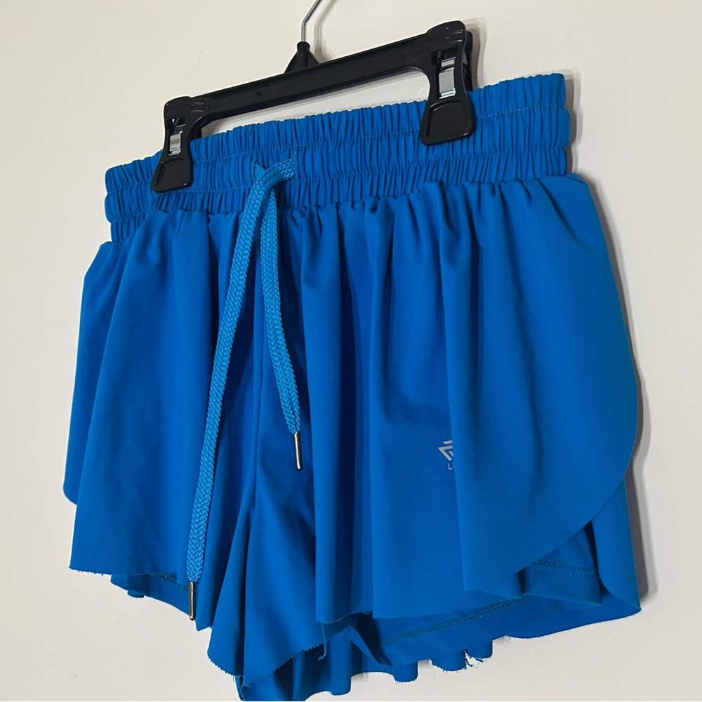 Blue athletic flowy shorts